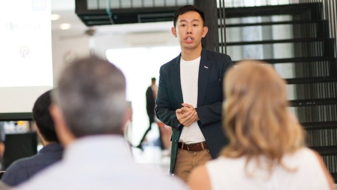 Jim Tan, President of the Sharing Economy Association of Singapore, shares his passion for the sharing economy at a Minister of State meeting event. Photo credit: Tan Tan.