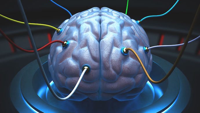 23303420 - brain with cables connected in a test of the power of the mind.