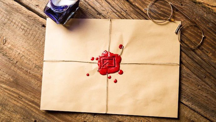 19439830 - envelope with imprinted sealing wax and inkwell with blue ink