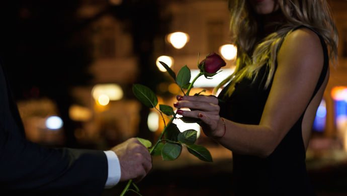 31174880 - woman getting rose on the first date